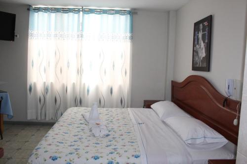 Postel nebo postele na pokoji v ubytování Hotel Caribe Azul