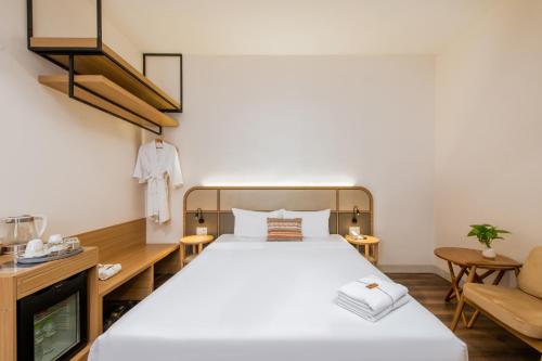 Letto o letti in una camera di Thanh Mai Hotel
