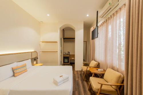 Letto o letti in una camera di Thanh Mai Hotel