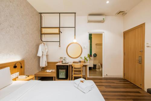 Letto o letti in una camera di Thanh Mai Hotel