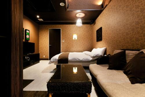 HOTEL GEN 福知山店にあるベッド