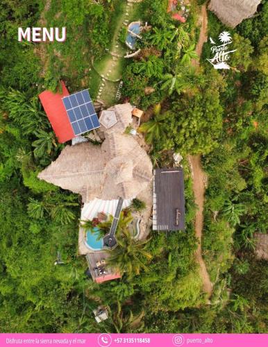 an overhead view of a house with a solar panel at Puerto Alto Hostel in Santa Marta