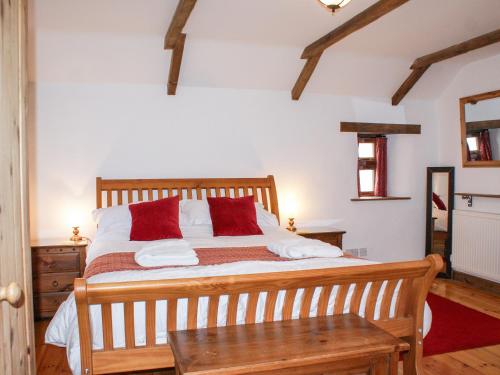 Postel nebo postele na pokoji v ubytování Samuels Cottage