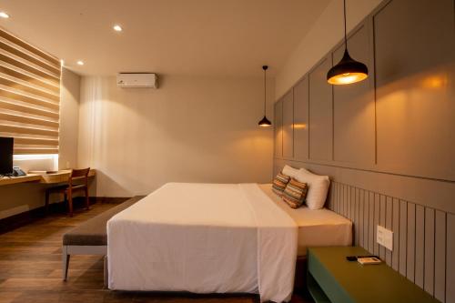 Letto o letti in una camera di Thanh Mai Hotel