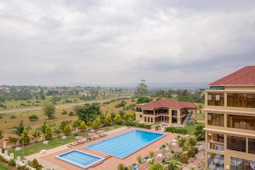 an aerial view of a resort with a swimming pool at Las Vegas Garden Hotel Mbarara in Mbarara