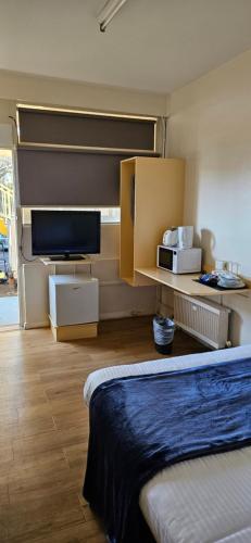 Billabong Motelにあるテレビまたはエンターテインメントセンター