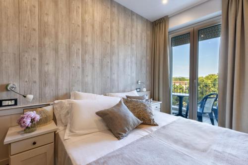Postel nebo postele na pokoji v ubytování Hotel Ambrosiana