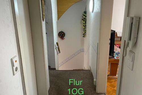 a view of a hallway with a flight of stairs at Semi-Detached House on 2 Floors in Giengen an der Brenz