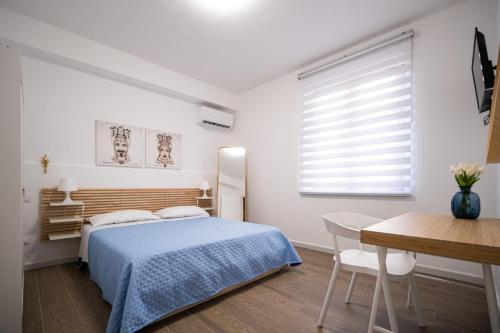 Postel nebo postele na pokoji v ubytování Matilde’s Holiday House