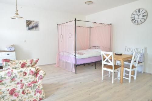 Postel nebo postele na pokoji v ubytování Apartmány MANDLE