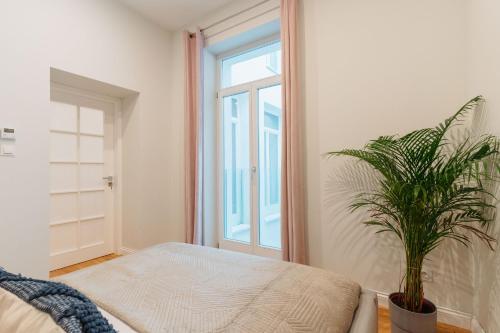 Letto o letti in una camera di Art Palace - LoftAffair Collection