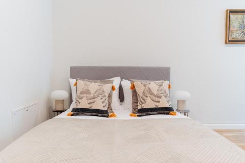 Letto o letti in una camera di Art Palace - LoftAffair Collection