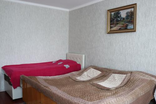 Una cama o camas en una habitación de Armazi
