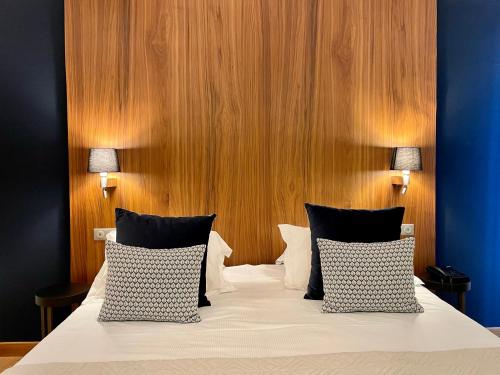 Letto o letti in una camera di Dormy House