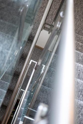 an overhead view of escalators in a building at Maiden Oval in London