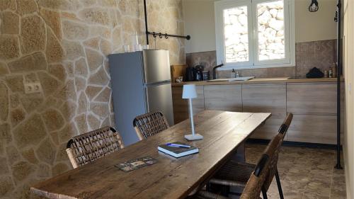 Η κουζίνα ή μικρή κουζίνα στο La Strade Apartments, Adults Only with Private Pool