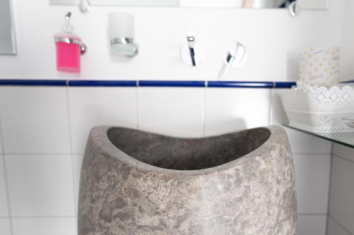 a bath tub in a bathroom with a sink at Hotel Villa Annalara charme and Relax in Amalfi