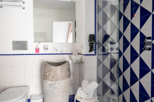 a bathroom with a toilet and a shower at Hotel Villa Annalara charme and Relax in Amalfi