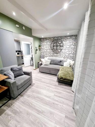 Χώρος καθιστικού στο Cosy Hideaway Lodge in Glan Gwna