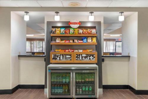 a drink cooler in a fast food restaurant at Comfort Inn Plano-Dallas in Plano