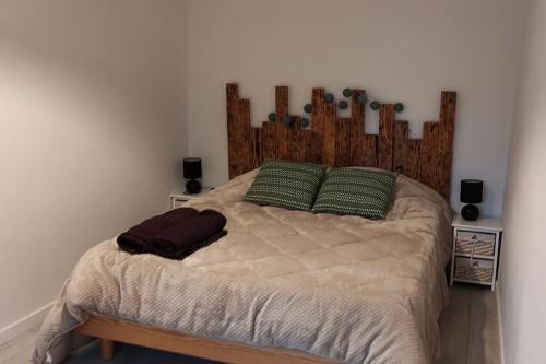 Ένα ή περισσότερα κρεβάτια σε δωμάτιο στο La Maison Des Sources ( wifi )