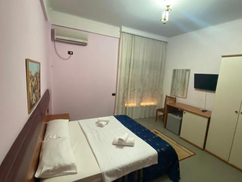 TV a/nebo společenská místnost v ubytování Hotel Edland