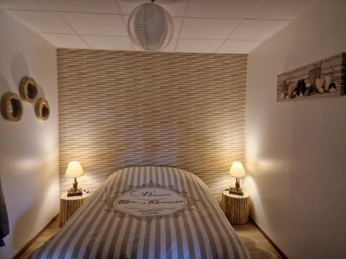 Postel nebo postele na pokoji v ubytování Gîte domaine de la galopade