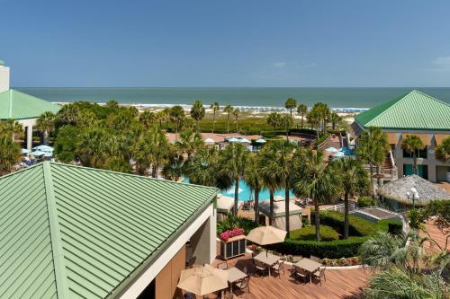 an aerial view of a resort with a swimming pool and the ocean at The Westin Hilton Head Island Resort & Spa in Hilton Head Island
