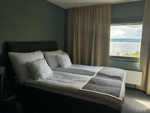 Postel nebo postele na pokoji v ubytování Hotell Wilhelmina