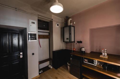 Dapur atau dapur kecil di Apartments JustLvivIt at the Rynok Square