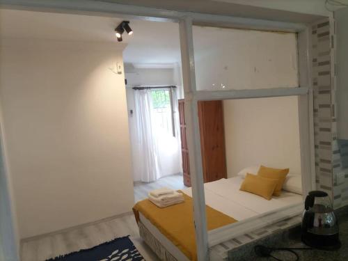 Postel nebo postele na pokoji v ubytování Plaja 75 metre uzaklık 1+1 daire