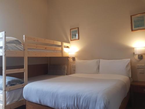 Ένα ή περισσότερα κρεβάτια σε δωμάτιο στο Aberdeen House