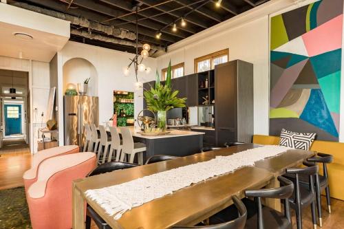 a dining room with a table and some chairs at City View Arthouse in Brisbane