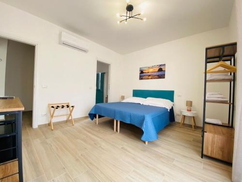 Postel nebo postele na pokoji v ubytování Guest House Tramontana 19