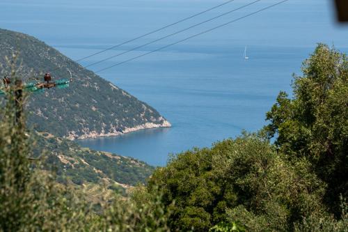 a view of the ocean from a hill at Key to Sunset in Angón