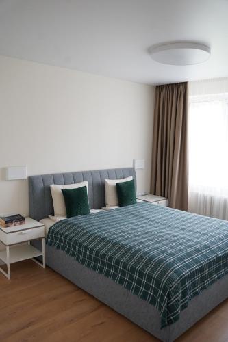 Ένα ή περισσότερα κρεβάτια σε δωμάτιο στο Sonata apartment