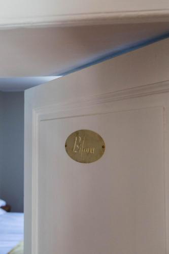 a door with a sign that says blume on it at Ca Meison in Cannobio