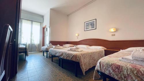 Postel nebo postele na pokoji v ubytování Hotel Villa Verde
