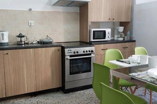 A kitchen or kitchenette at Fokionos Athens Centre 5 BD, 1,5 BATH