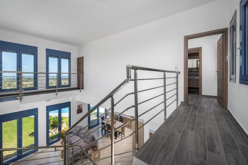 an image of a staircase in a house at Kolymbia Village in Kolimbia