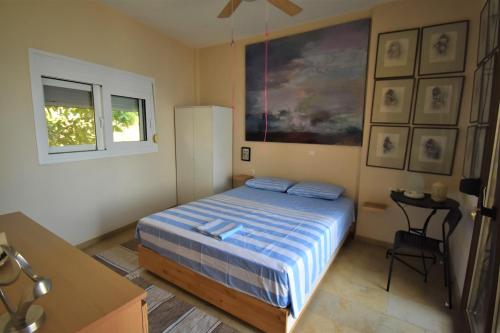 Postel nebo postele na pokoji v ubytování Modern seaside maisonette 130 m2 Oikia Litsas Paliouria Larissas