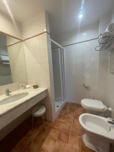 Koupelna v ubytování Hotel La Lampara