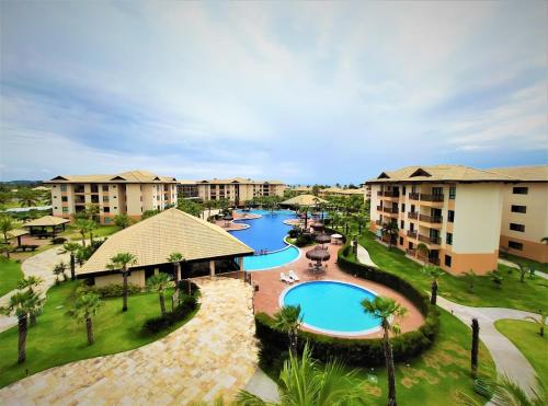an aerial view of a resort with two pools at VG Sun Cumbuco Sea Breeze Vista Mar in Cumbuco