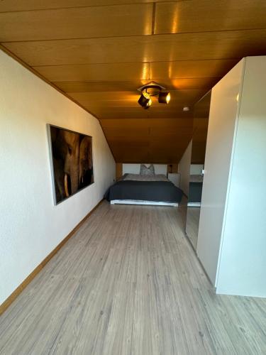 a room with a bed and a ceiling at In der Natur gelegene Wohnung mit Weitblick in Hüthum