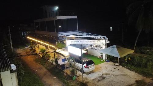 a car parked in front of a building at night at Ngoc An Hotel in Tây Ninh