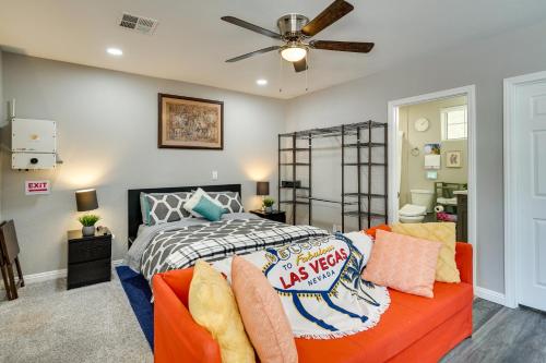 a bedroom with a bed and a ceiling fan at Sunny Las Vegas Studio with Shared Pool and Backyard! in Las Vegas