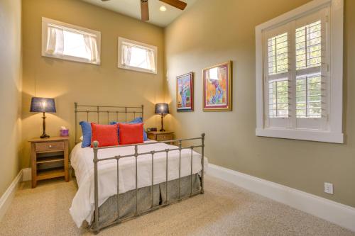 a bedroom with a bed and a window at Cozy New Orleans Getaway Near Magazine Street! in New Orleans