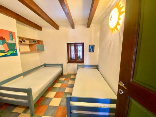 Ένα ή περισσότερα κρεβάτια σε δωμάτιο στο Romantic maisonette