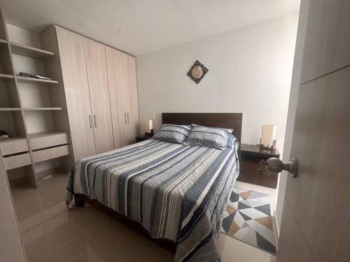 Krevet ili kreveti u jedinici u okviru objekta Apartamento en Barranquilla