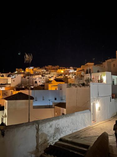 a view of a city at night with buildings at Almaraz11 in Vejer de la Frontera